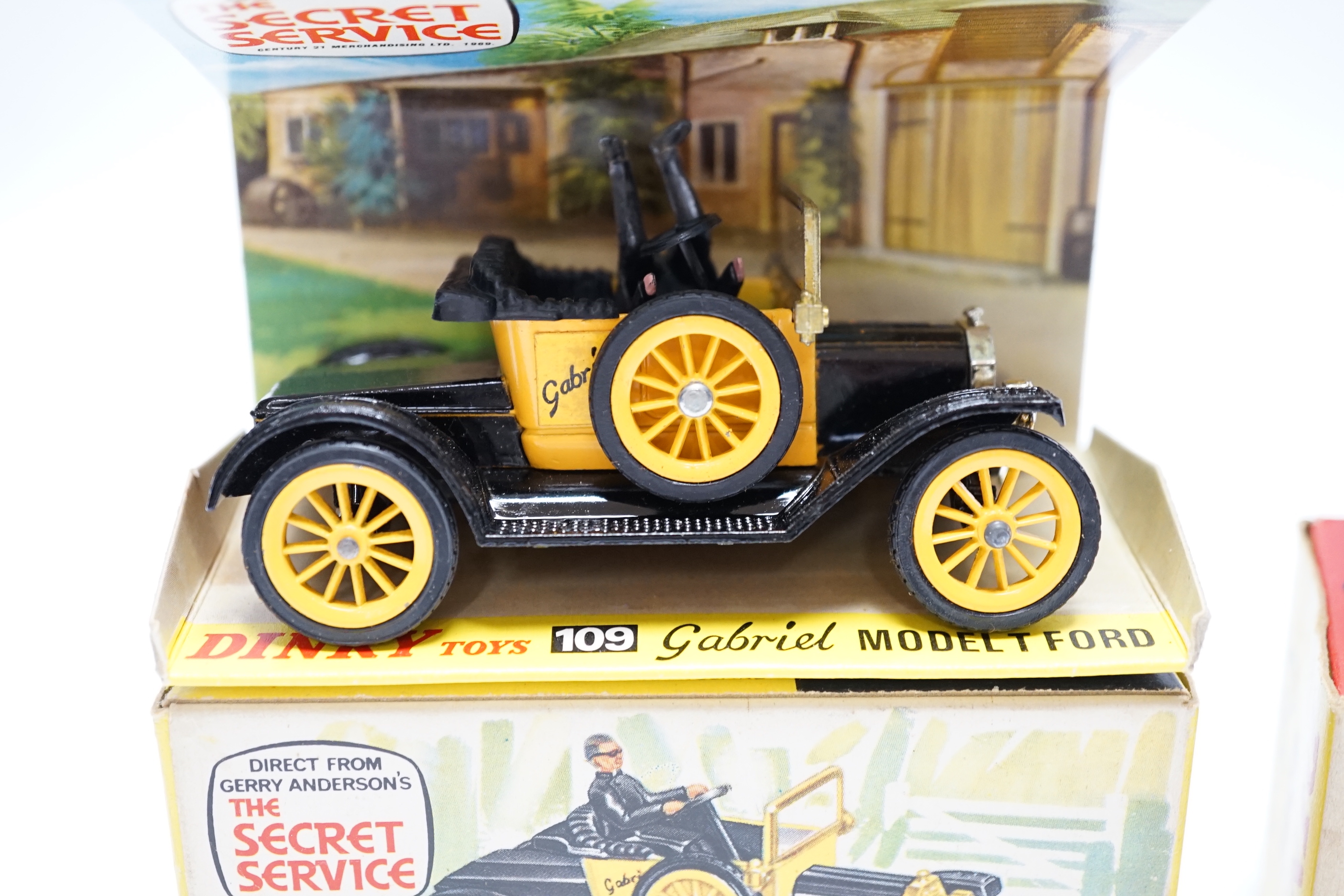 Two Dinky Toys (109) Gabriel Model T Ford, both boxed with inner display stands